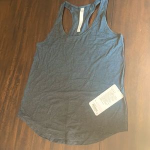 Brand new never used LOVE tank Lululemon sz 10